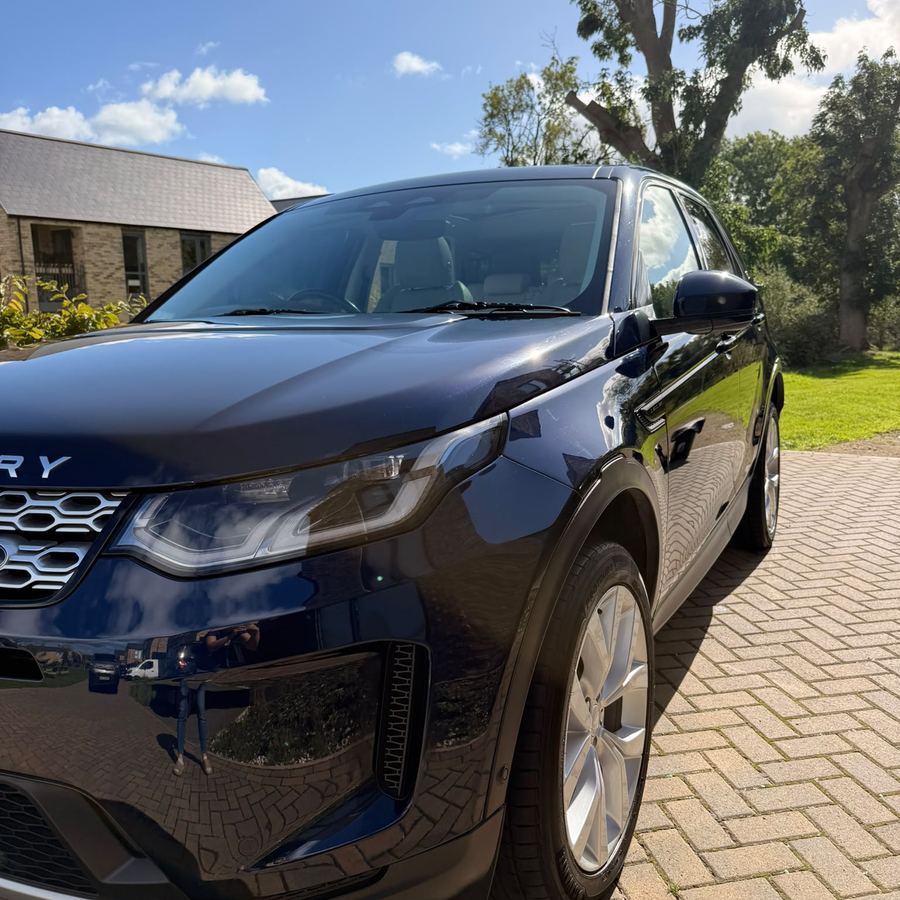 A navy Range Rover Evoque gleaming after a full valet in Harrogate